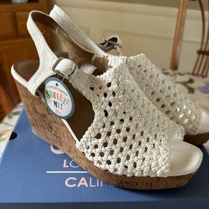 New never worn Jellypop Adelie white wedge. Size 9.5